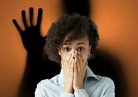 dark shadow behind woman about to scream creepy short stories