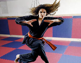 Lieutenant Nina Fireheart in karate gee exercising